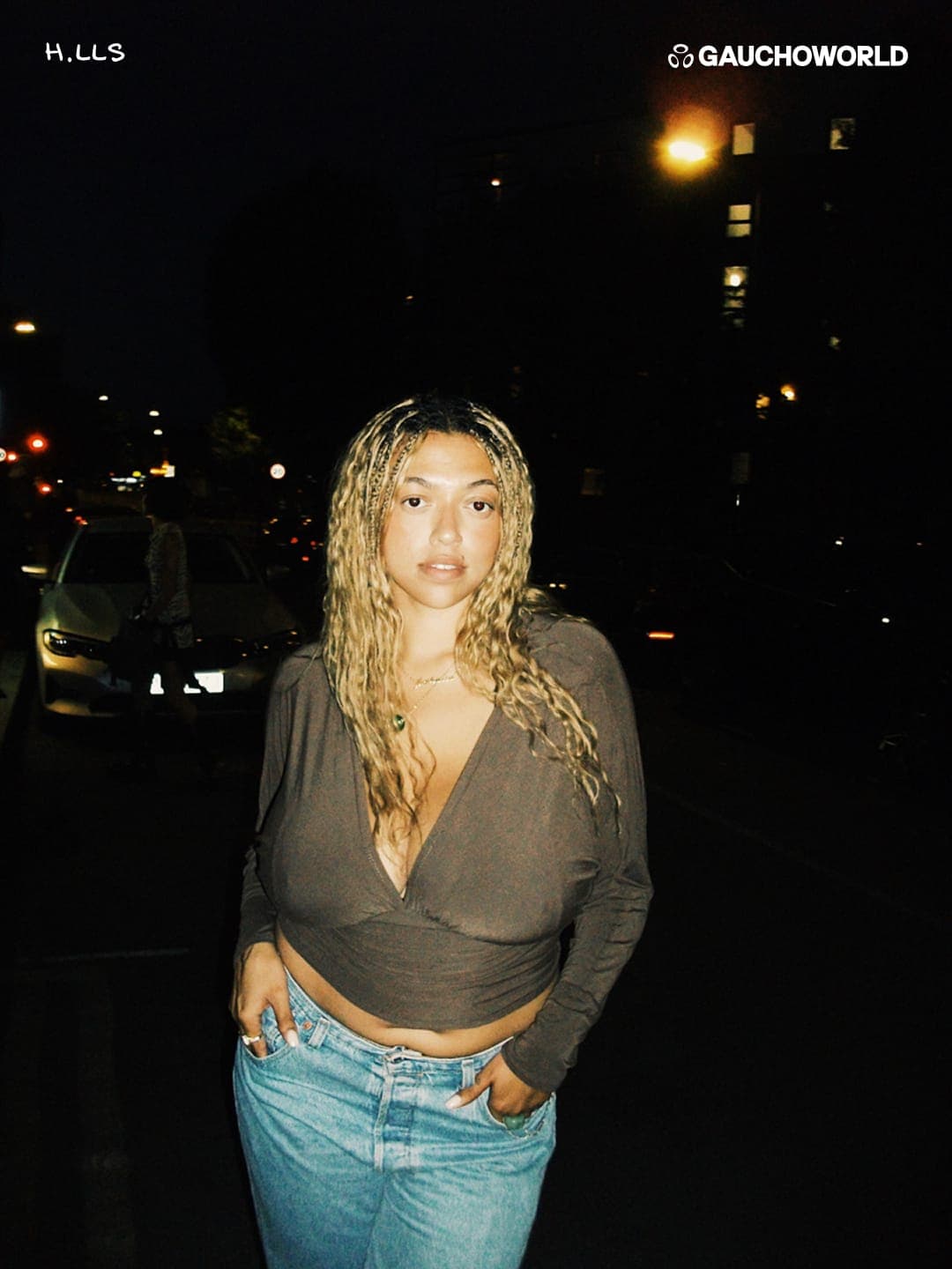 A friend with long blonde braids on a night street, H.LLS × Gauchoworld frame